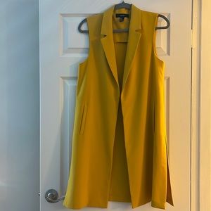 Forever 21, mustard colored sleeveless blazer.